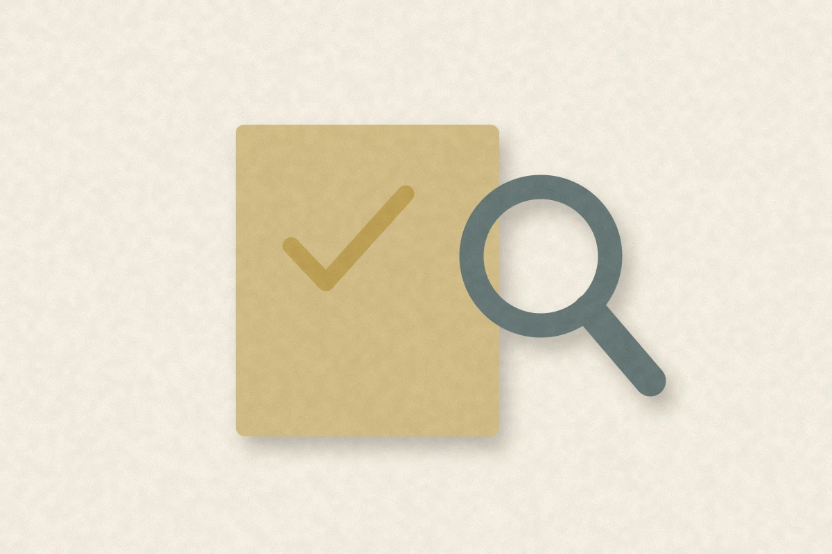 Paper-cut document with a check mark and a magnifying glass, illustrating verifying insurance status.